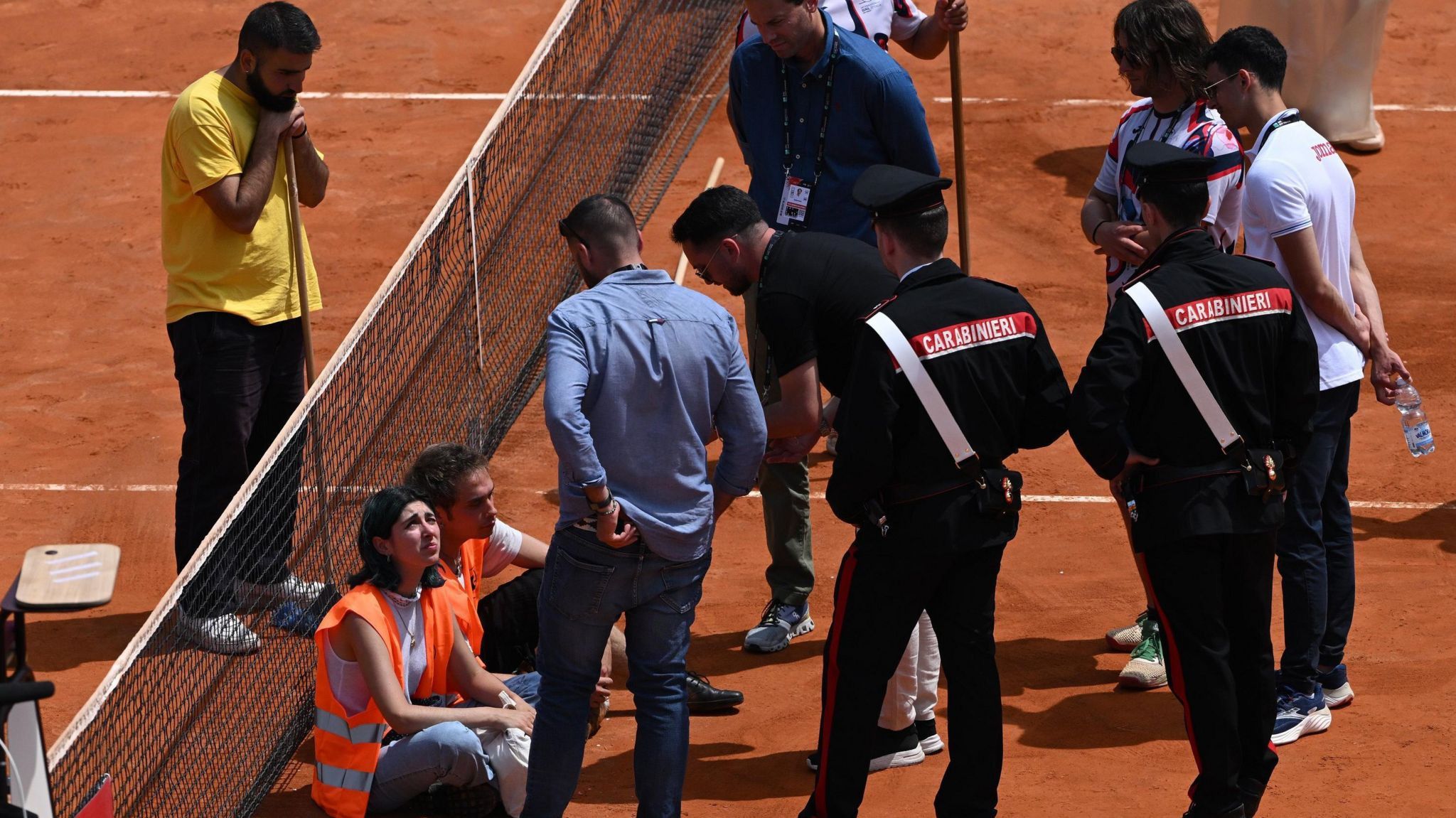 Climate protester interrupt two Italian Open match