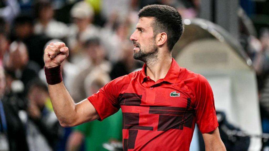 Djokovic overcomes 'issues' to set up Sinner final