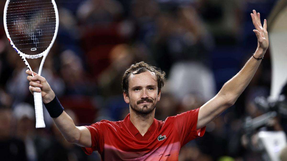 Angry Medvedev battles back to reach last 16