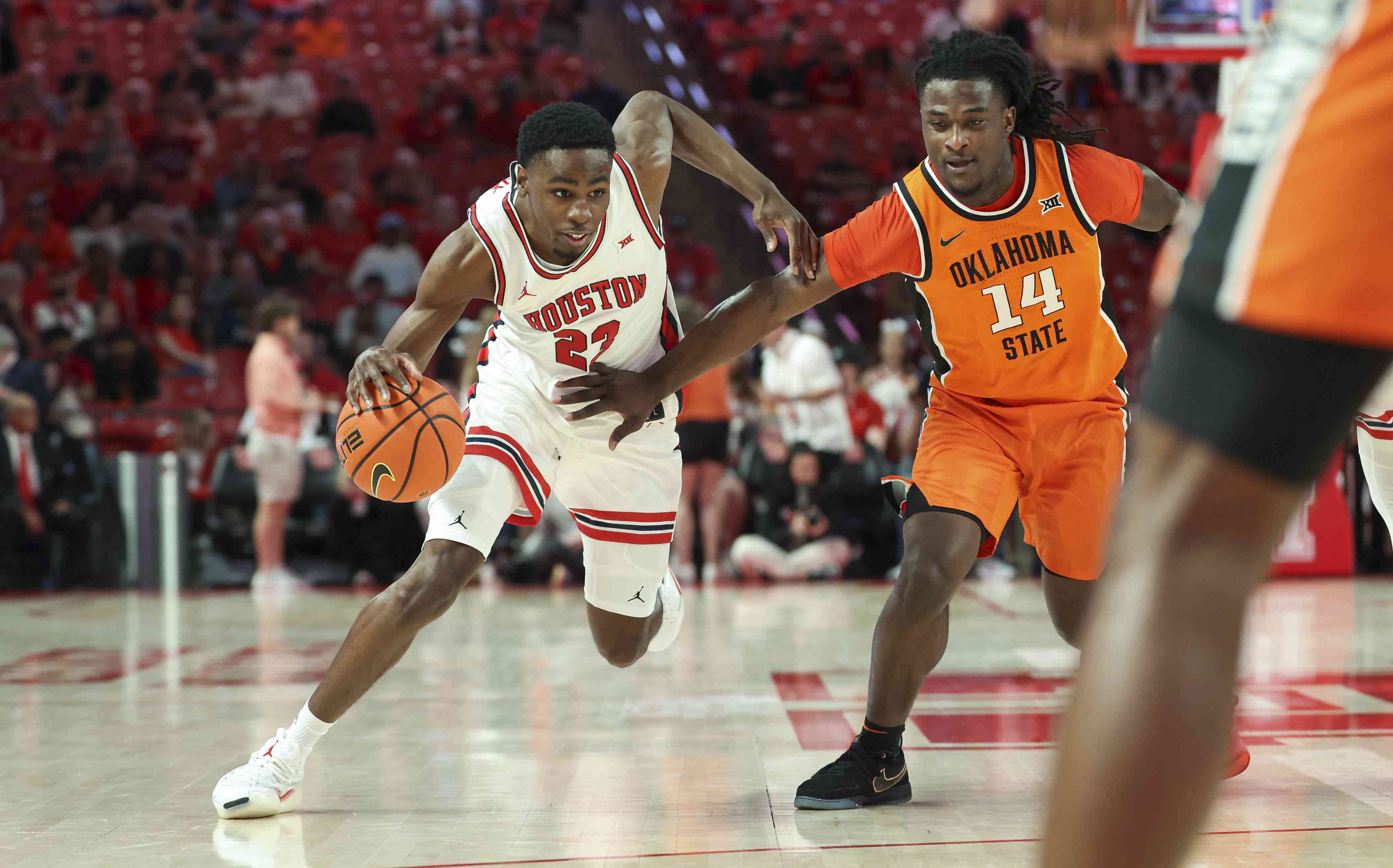 Houston Holds Off Oklahoma State Despite Key Injuries