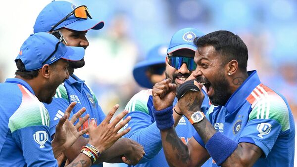 India Dominates Champions Trophy, Secures Semi-Final Spot