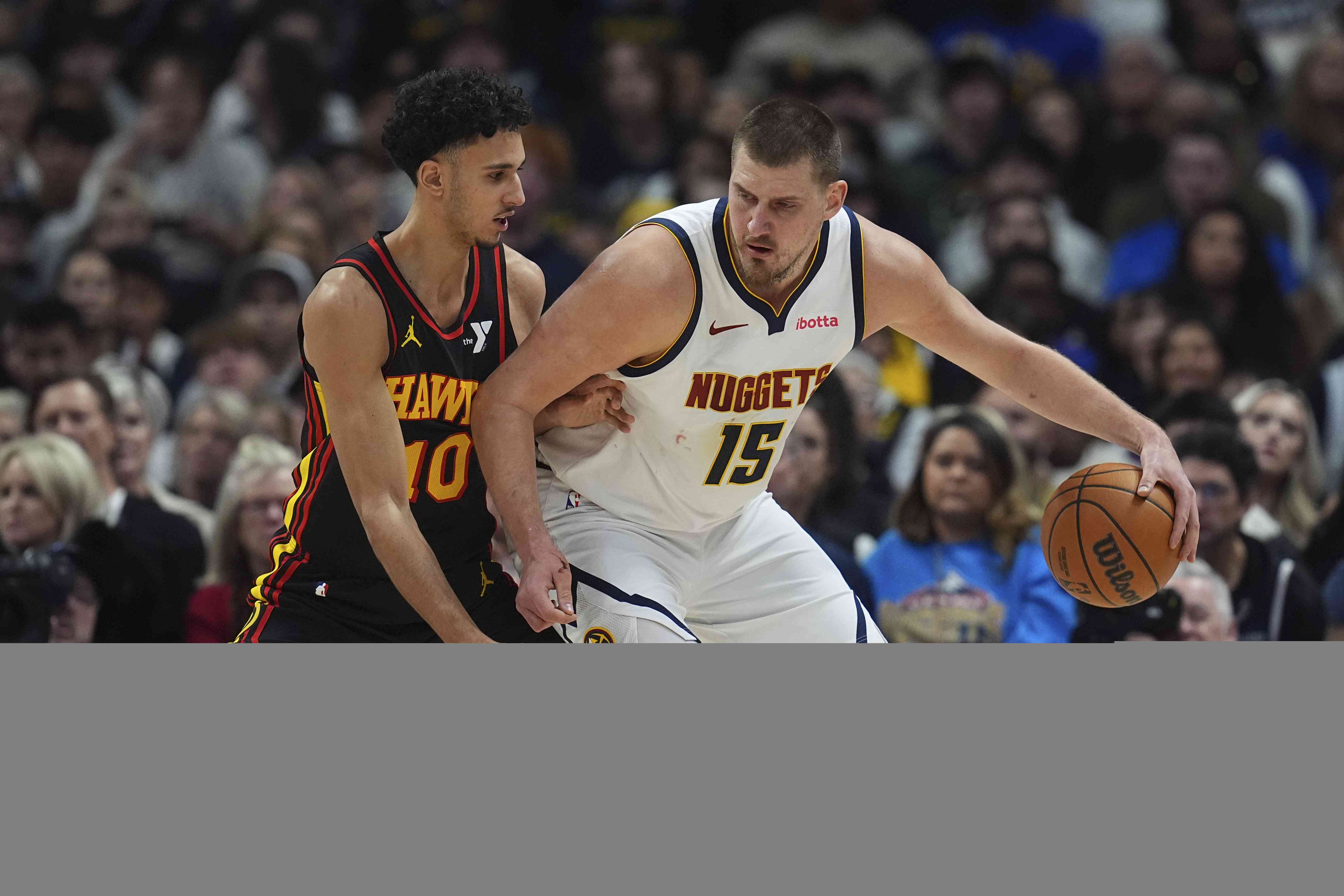 Jokic`s Triple-Double Leads Nuggets Past Bucks