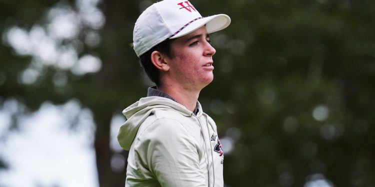Holmes Triumphs in Rainy Match Against Campbell
