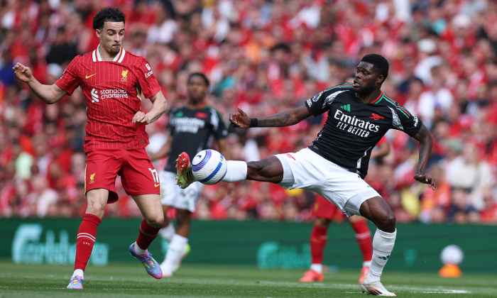 Arsenal och Liverpool delade på poängen i dramatik